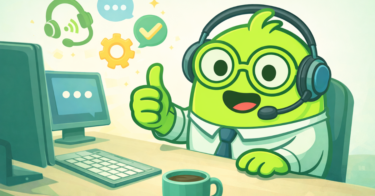 A customer support BOB wearing a headset, shirt and tie signals thumbs up while working at a desktop computer